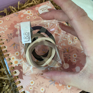 Lola & Boo Collective cute filler gift set with pink hair clips, mini elastic bands, and natural tone mini flower clips