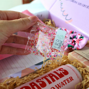Lola & Boo Collective cute filler gift set with pink hair clips, mini elastic bands, and natural tone mini flower clips