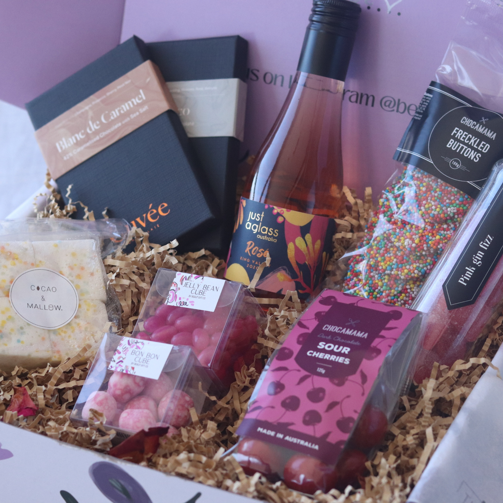 sweet tooth box filled with chocolate, candy and wine
