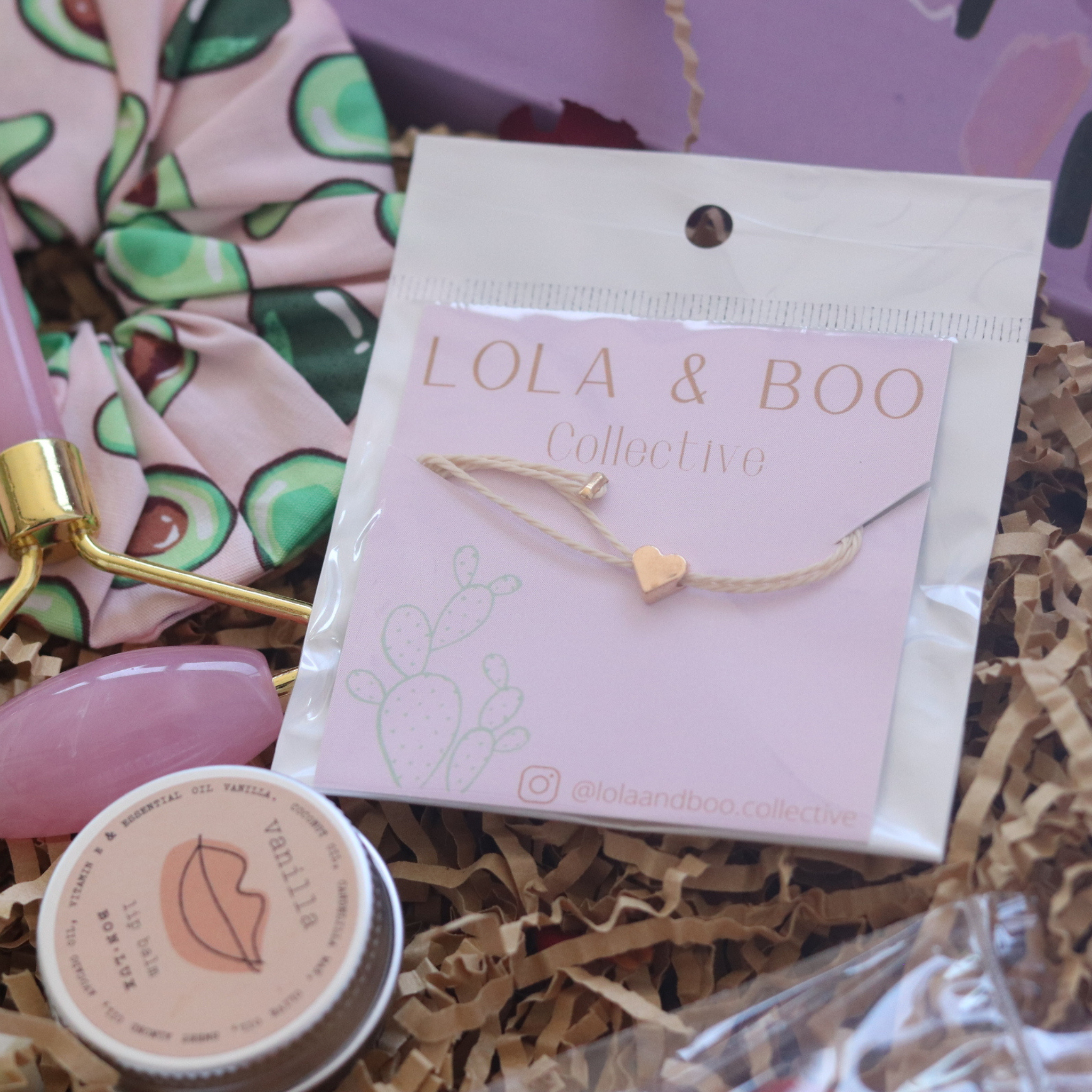 minimalist bracelet with rose gold heart and cream thread