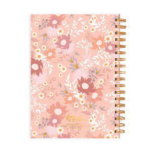 back of an a5 note book or sketch book that is pink and peach with flowers