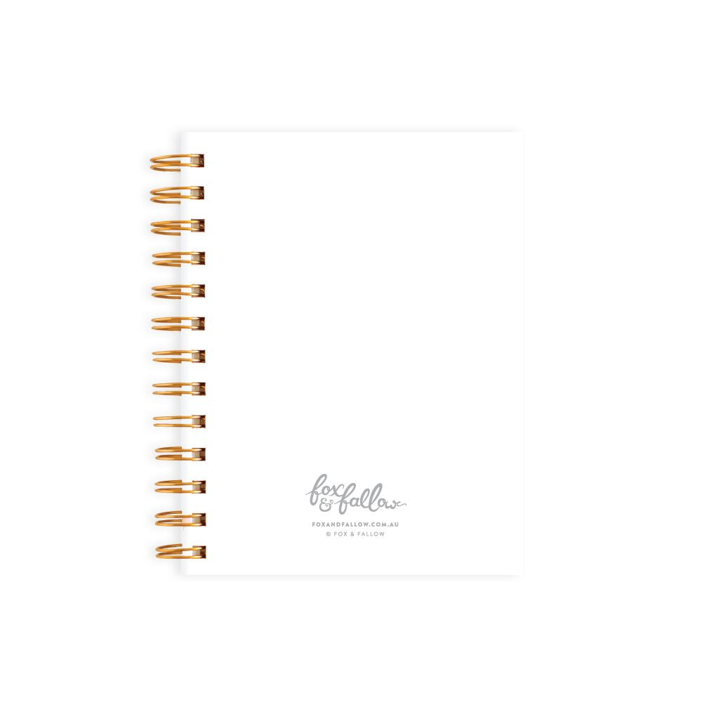 Fox & Fallow Mini Spiral Notebook purple cover with peach, pink and white flowers, the inside is blank white pages
