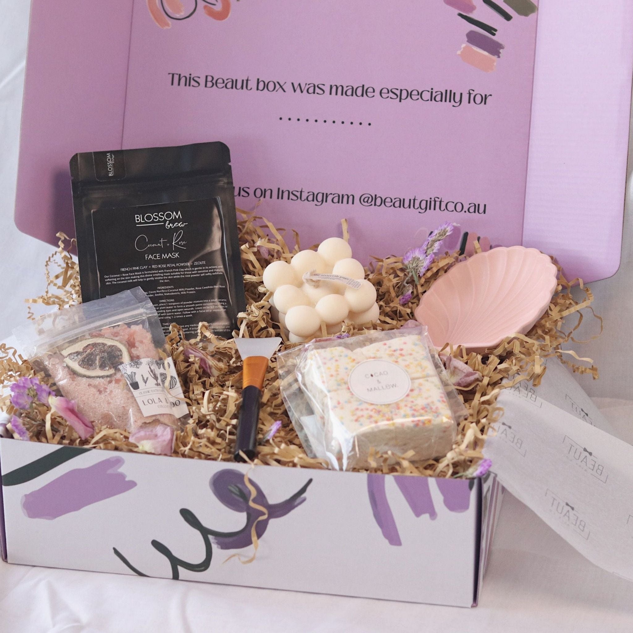 gift box featuring a face mask, bath salts, marshmallows, candle and mixing shell. sydney based gift boxing with free delivery