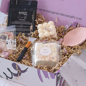 gift box featuring a face mask, bath salts, marshmallows, candle and mixing shell. sydney based gift boxing with free delivery