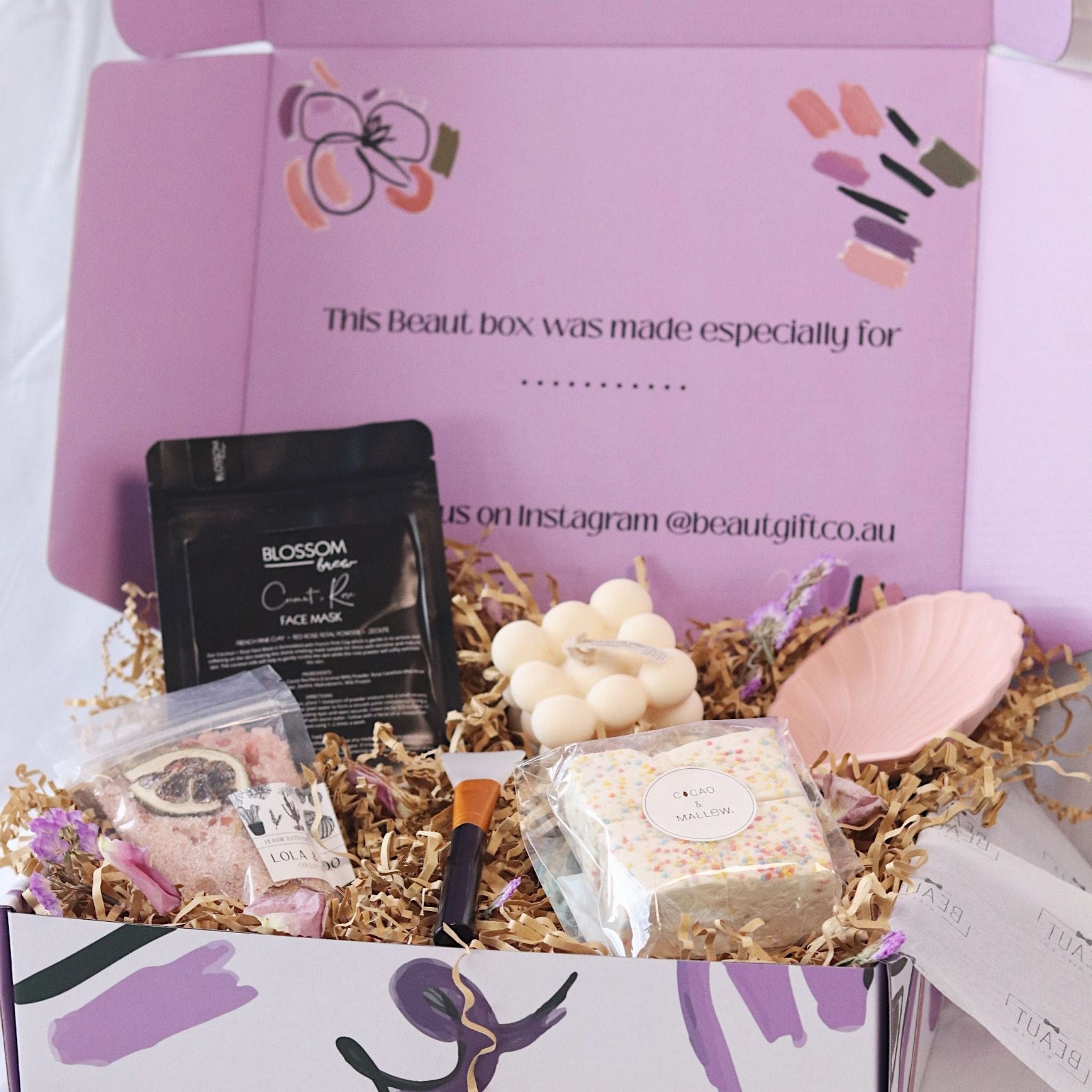 gift box featuring a face mask, bath salts, marshmallows, candle and mixing shell. sydney based gift boxing with free delivery