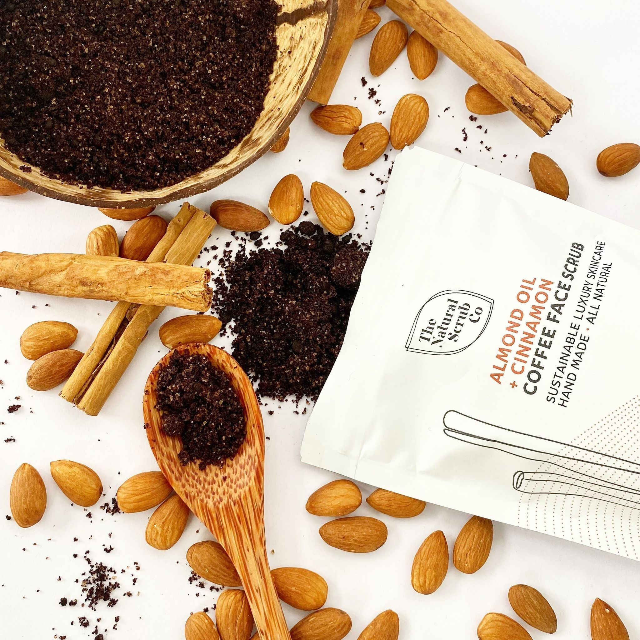white pouch of coffee face scrub
