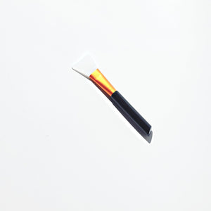 silicone face mask applicator in black